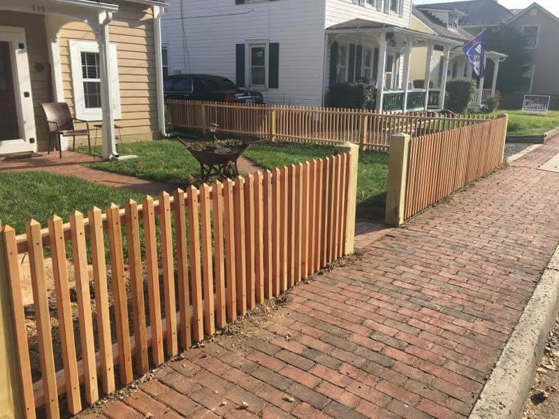 sidewalk fence in milton